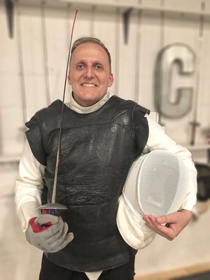 Eric Howard, Coach Eric is an accomplished fencer and coach, having ran the Vanderbilt University Fencing Club for 16 seasons. During this time, Coach Howard restored the program to dominance, creating one of the strongest club teams in the Nation. His athletes have successfully competed at the Jr. Olympics and the U.S. National Championships. He has also attended the U.S. Fencing Coaches Association's Coaches Academy, earning his Level 2 Coaching Certification, which is internationally recognized by the Academie d'Armes International (AAI) and its member organizations. Eric also founded the Cumberland d’Escrime fencing club in Nashville, and has served as the Chairman of the Tennessee Division of USA Fencing.