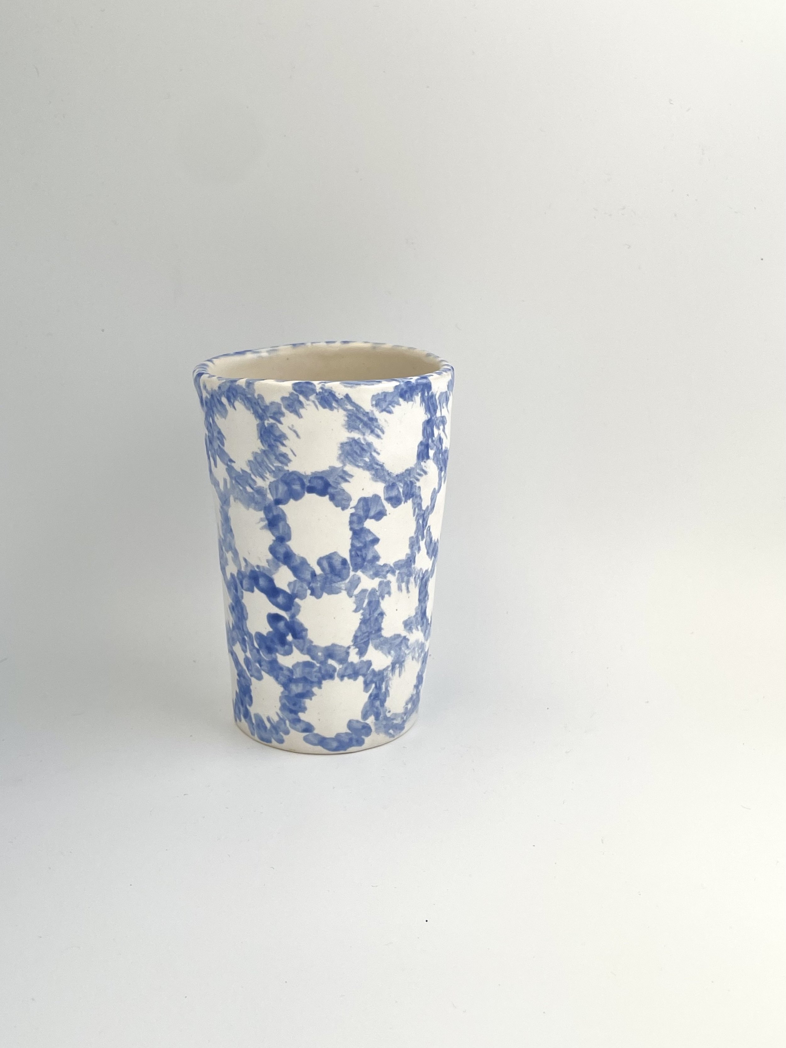 blue splatter circles on white med slab vase.jpg