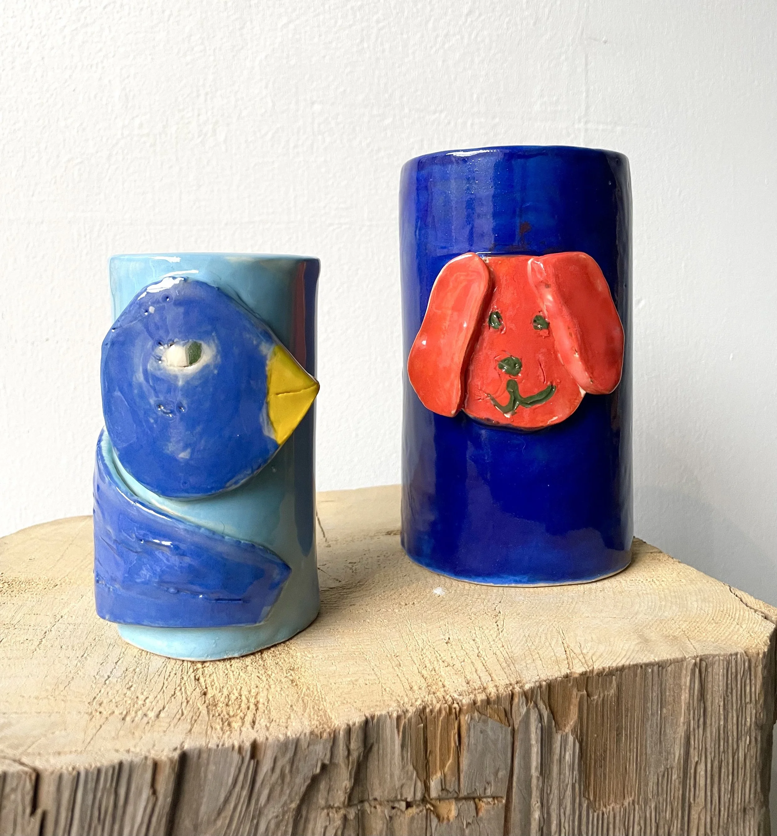 ceramic kid animal vases.jpg