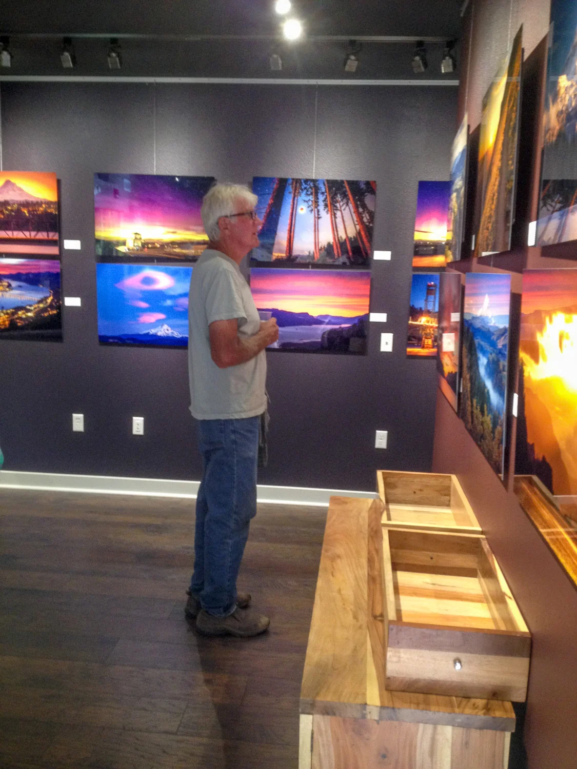 I had to sneak a quick iPhone snap of John checking out the work! 
