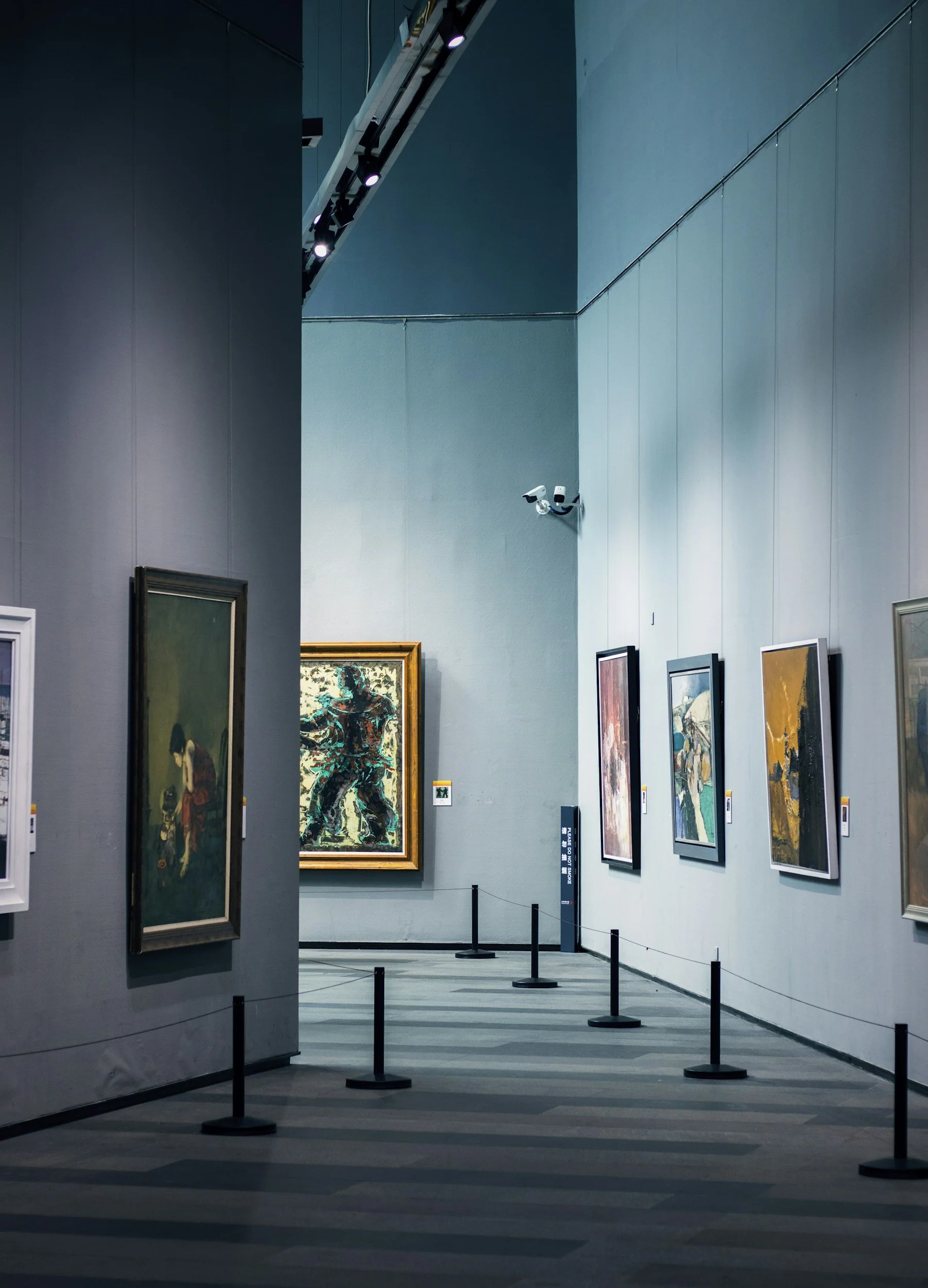 art appraiser reviewing a painting's documentation