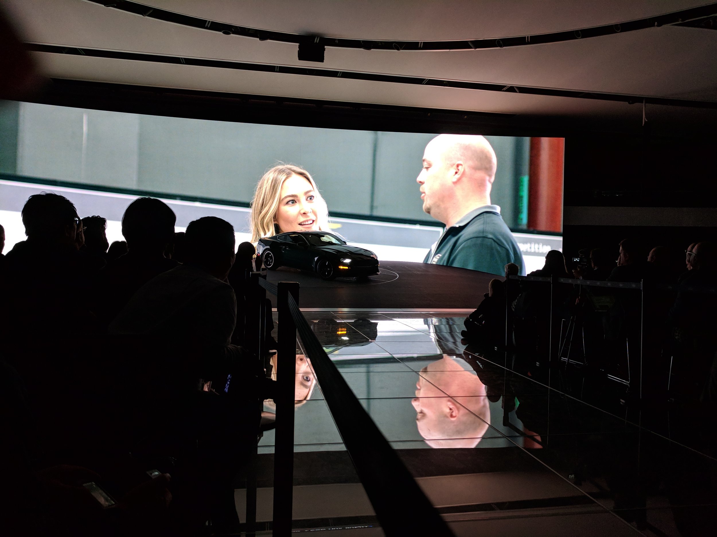   The auto writers and photographers were treated to a short video clip showing Molly McQueen and Sean Kiernan as she saw for the first time the original 1968 Bullitt Mustang.&nbsp; Property Brad Bowling   