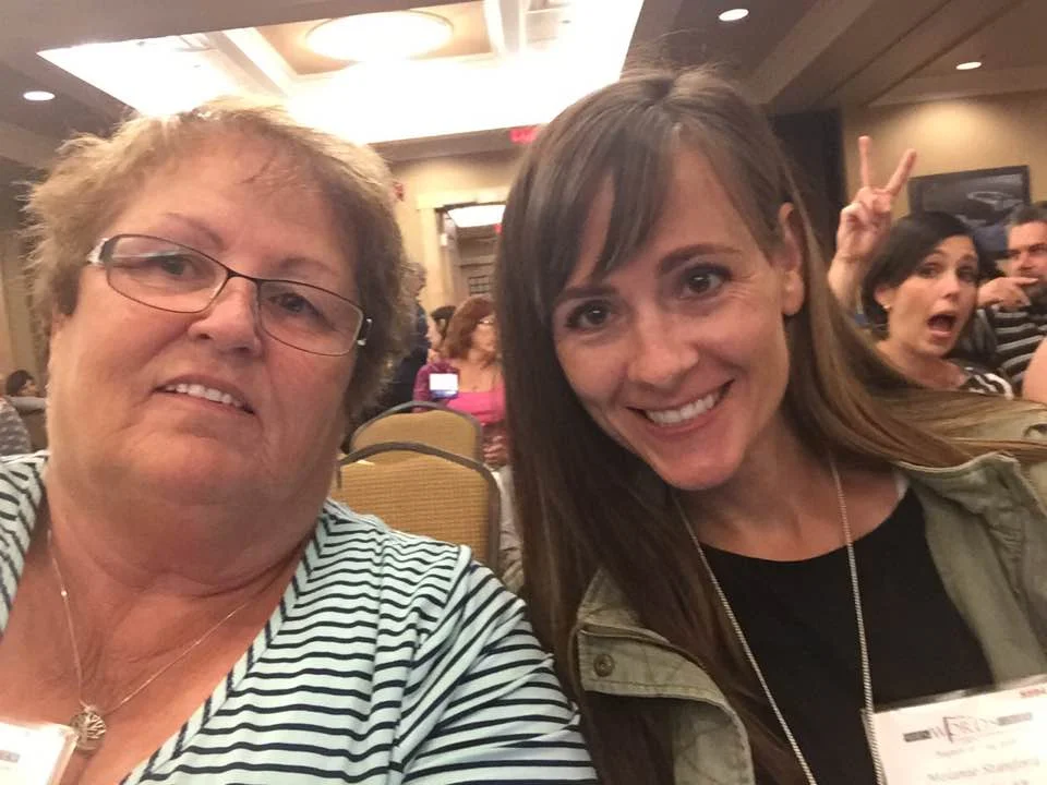 Me and my MIL Debbie before the keynote speeches (plus a photobomber in the background!)