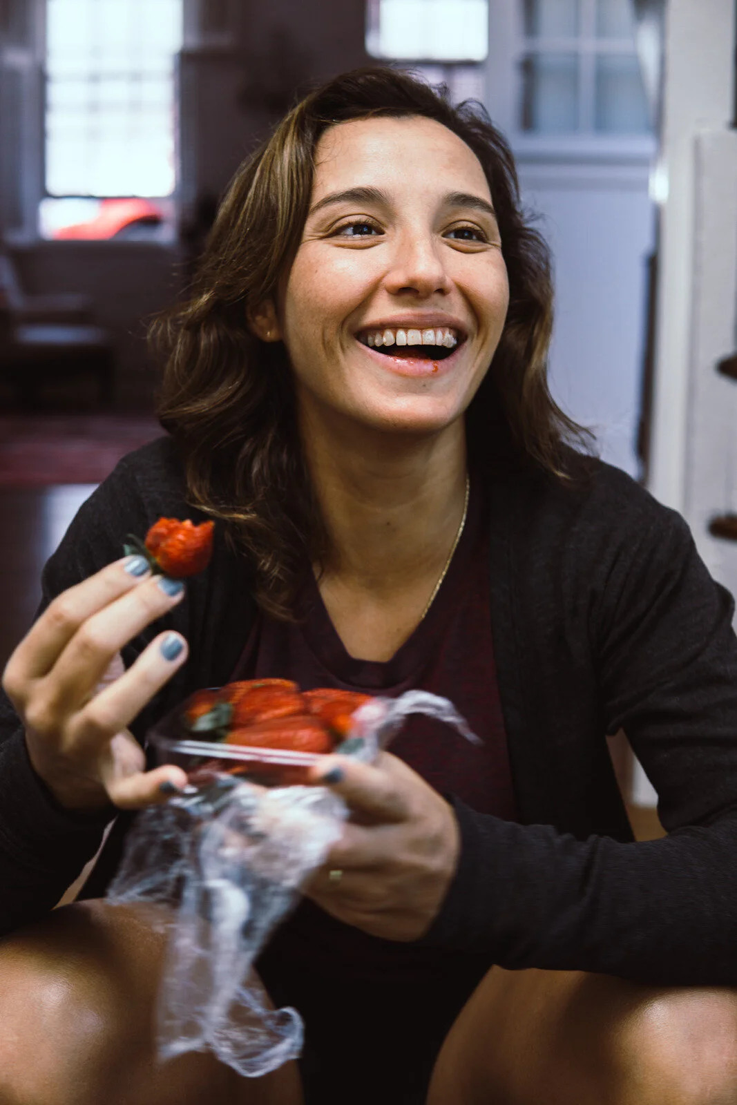 Canva - Woman Eating Strawberry Indoors.jpg