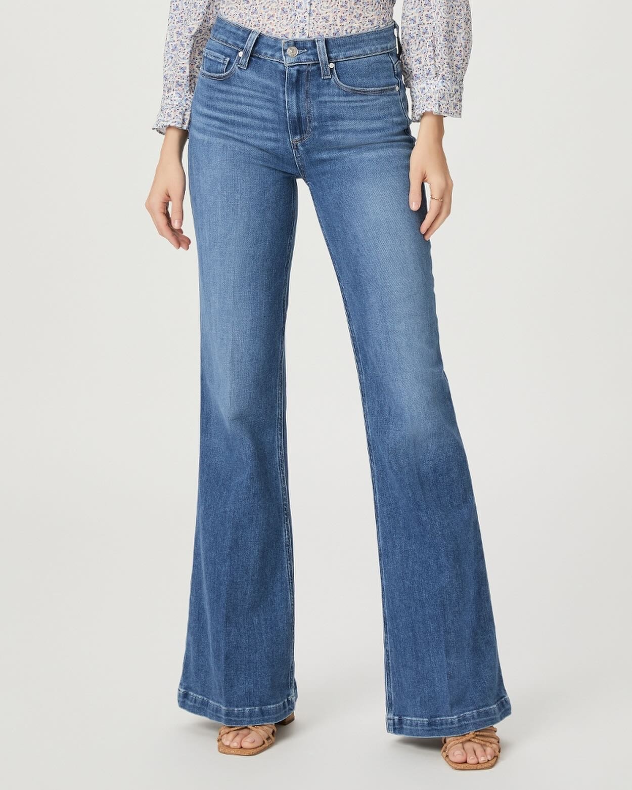 Meet Genevieve&hellip;. Genevieve is the perfect vintage-inspired, high-rise flare silhouette that gives your legs a long, lean look. Cut from our TRANSCEND VINTAGE denim in a bright medium blue wash, this style has the look of authentic vintage deni