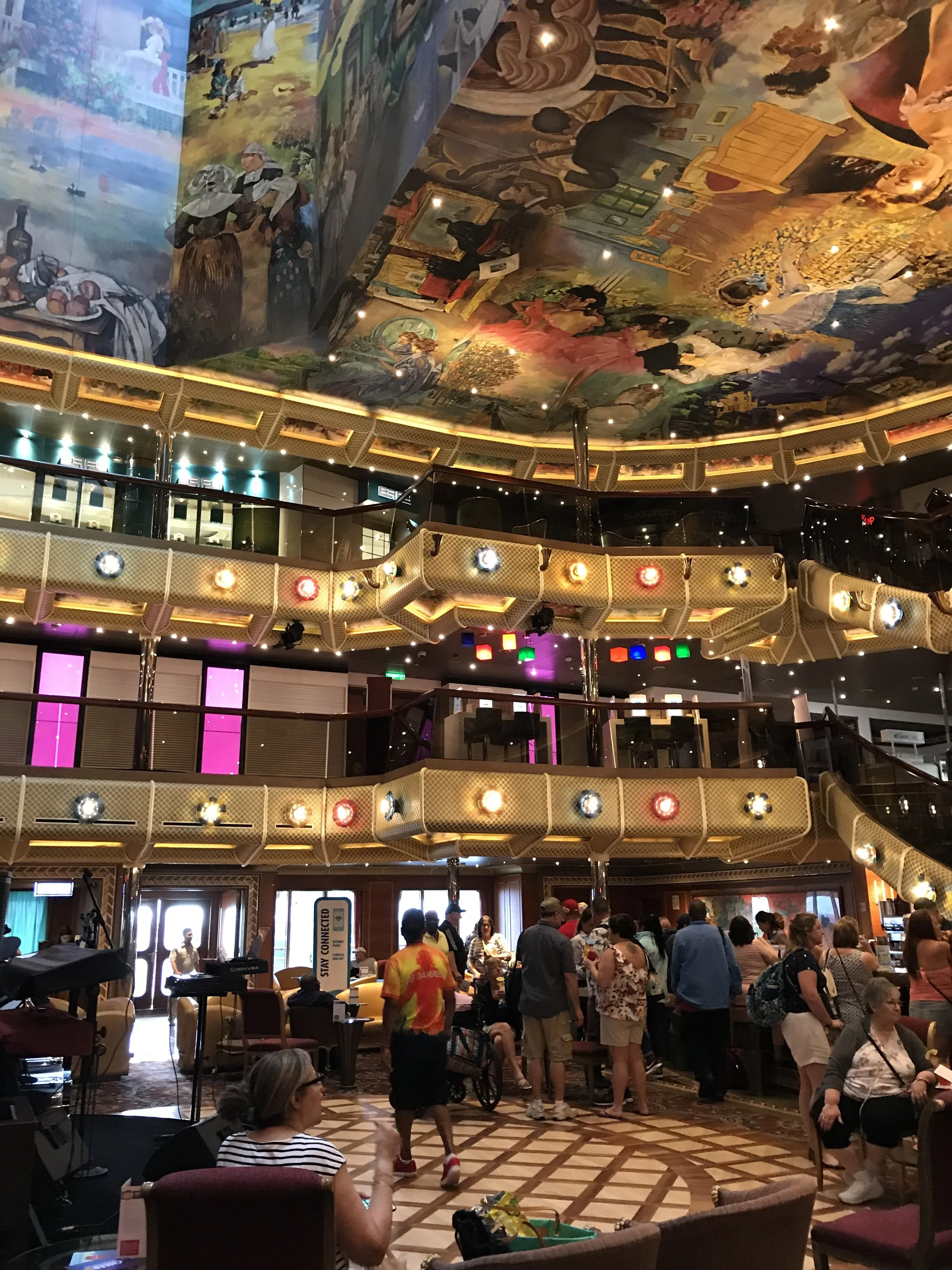 Look how gorgeous this Lobby is! Beautiful art up top and an awesome party below!