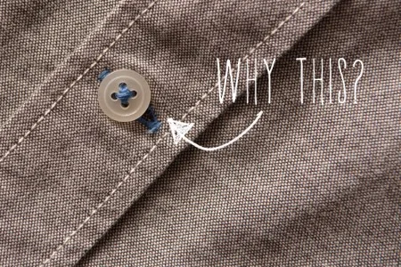 Have you noticed that the bottom buttonhole on your dress shirts are different than the rest of the buttonholes? It’s actually a practical design feature. The hole is sewn horizontally so that the buttons can endure more stress from pulling/movement than the others without stretching out the shirt or the hole itself. Think about it – the bottom buttonhole is usually going to be tucked in around your waist or over your butt. This area is the epicenter of movement and the shirt will be pulled and moved all over the place. If the hole was vertical like the ones on the chest and torso, the stress from the movement would pop it off. Being horizontally placed gives the button more wiggle room. There’s also more stitching around the lowest buttonhole. It provides stronger reinforcement so that the button stays in place. The buttonholes on the torso are vertical so the shirt can have the best fit possible. 