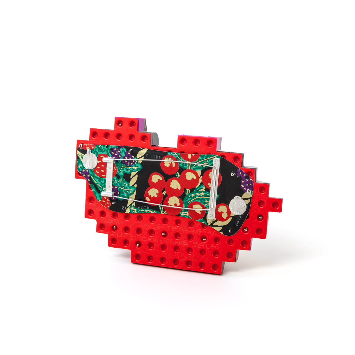 Lip 3: Our Lips Are Sealed (brooch back)