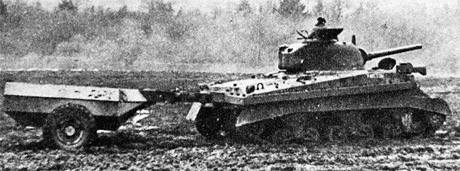 A Sherman Crocodile. This variant carried supplementary flamethrower goo in that trailer.