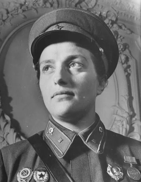A slightly more formal photograph of Pavlichenko. Like most living soviets in the '40s, she didn't often put her rifle down for very long.