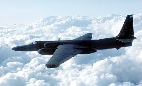 It's customary to paint weather planes low-viz black. It's important the weather doesn't see them at night, so as to not contaminate the science.