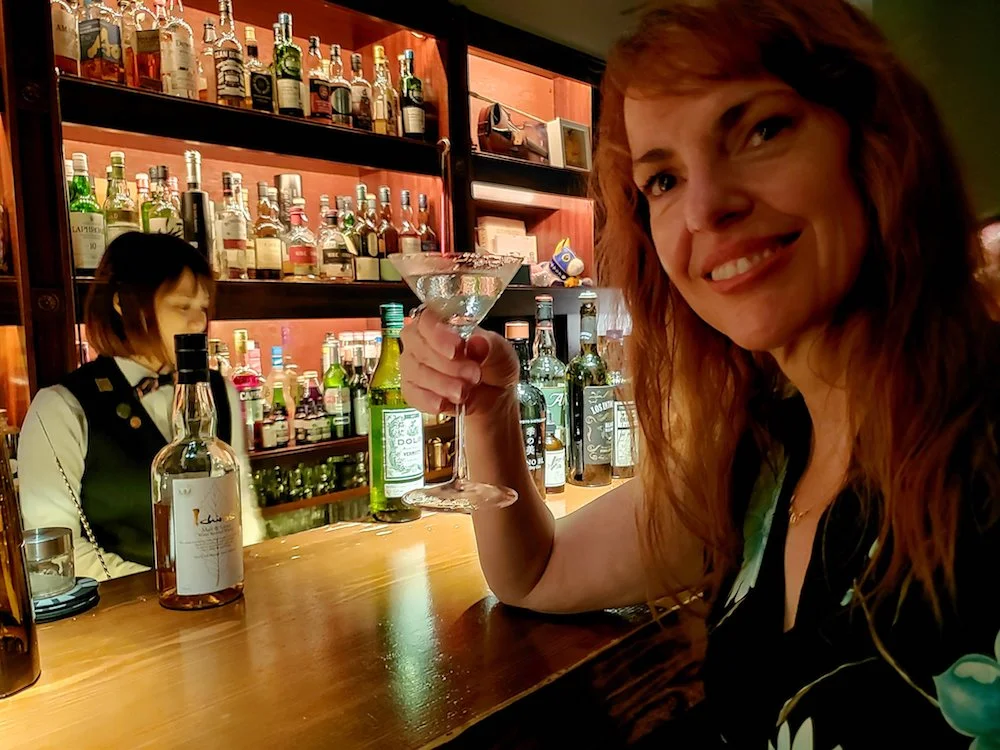 Selena enjoying a cocktail at Bar Algernon in Ginza, Tokyo.