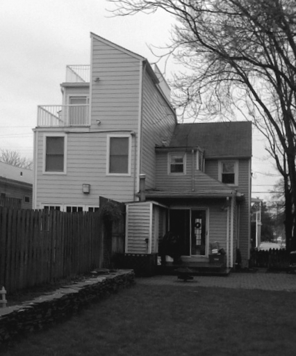 Before - the duplex on the right being dwarfed by it's neighbor.