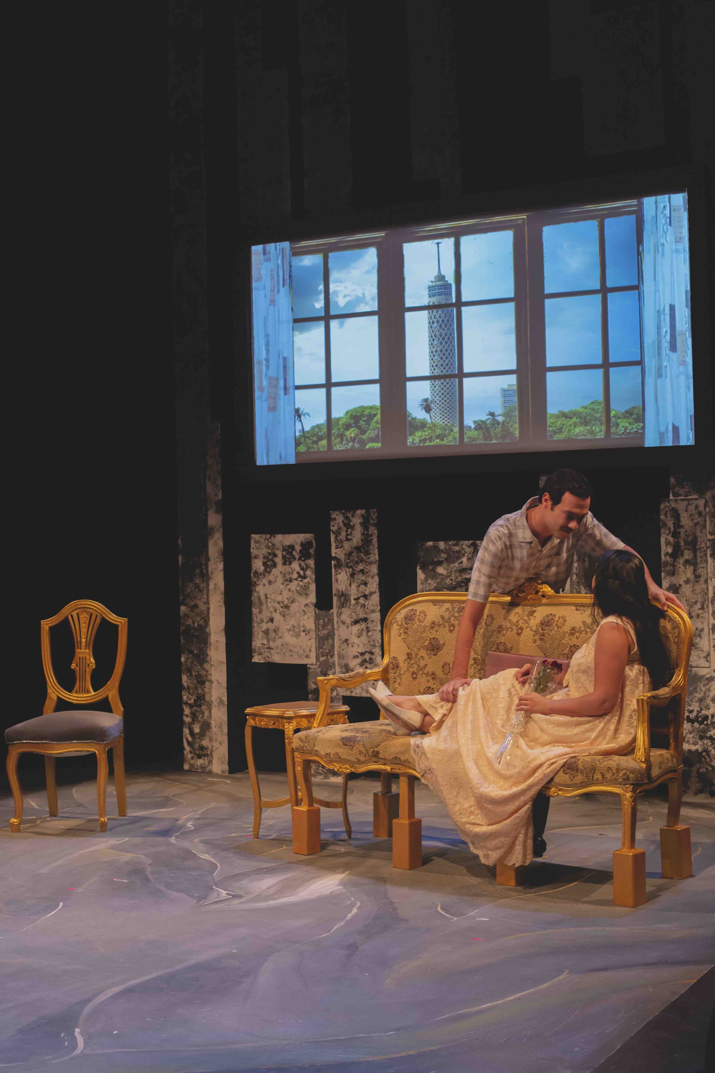 Stories About Us- Scene 1 starts warm and loving as a couple begins their marriage. Through the window the view is open and unobstructed.