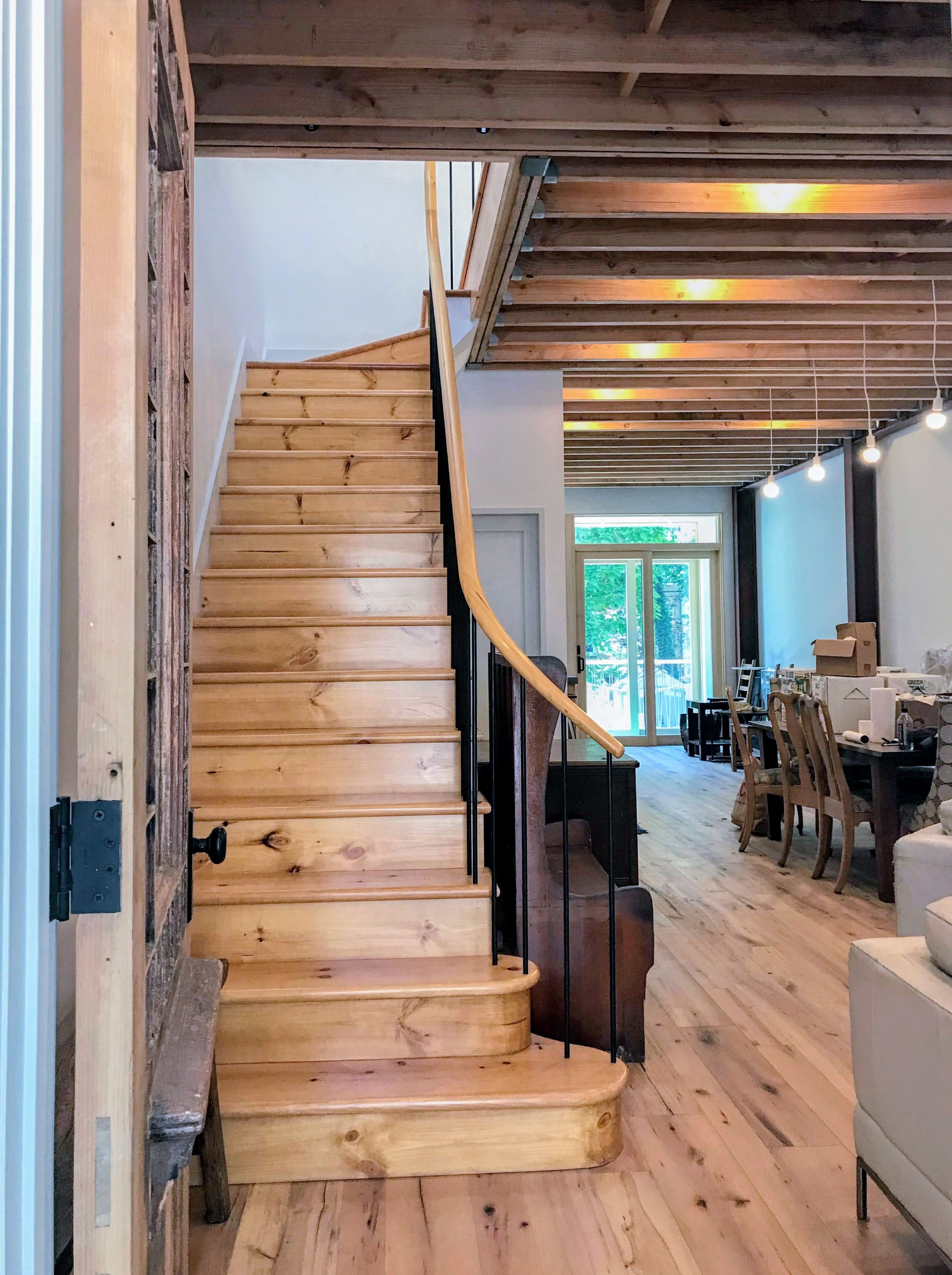 The house is heated through radiant heat floors. By heating surfaces rather than air, radiant heat systems can be more energy-efficient. 