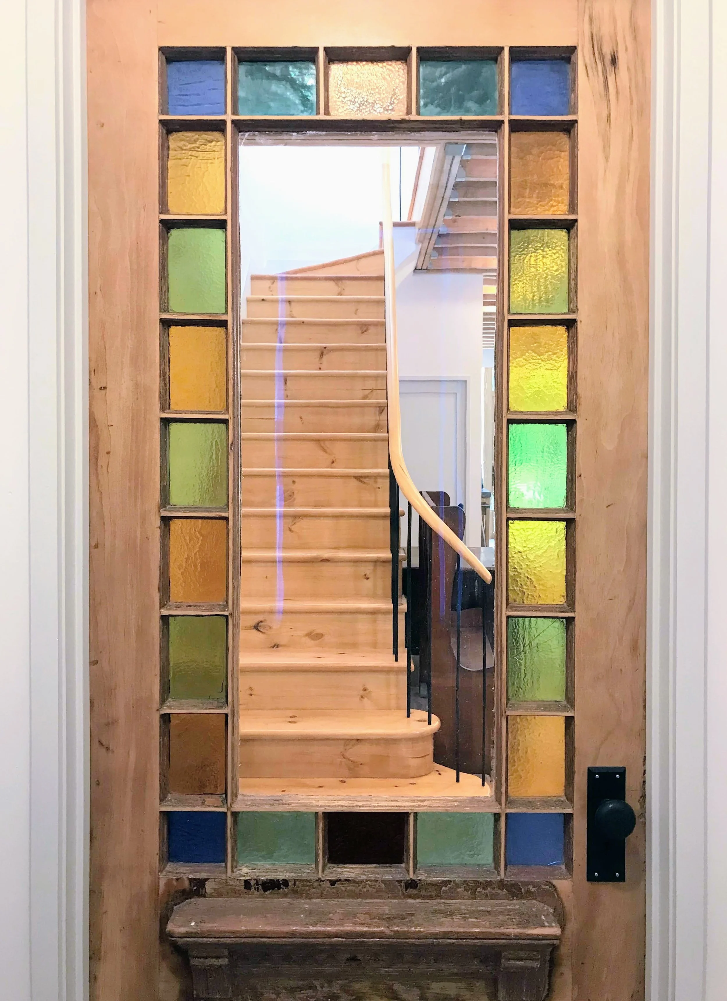 The vestibule door is one of many original elements that was carefully restored.