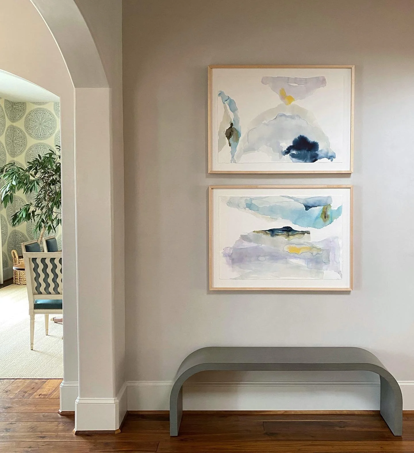 ✨Got these beauties on the wall today ✨ I love the touch of color they add to this plaster foyer. 
.
.
#art #houstoninteriors #libbablalockinteriors