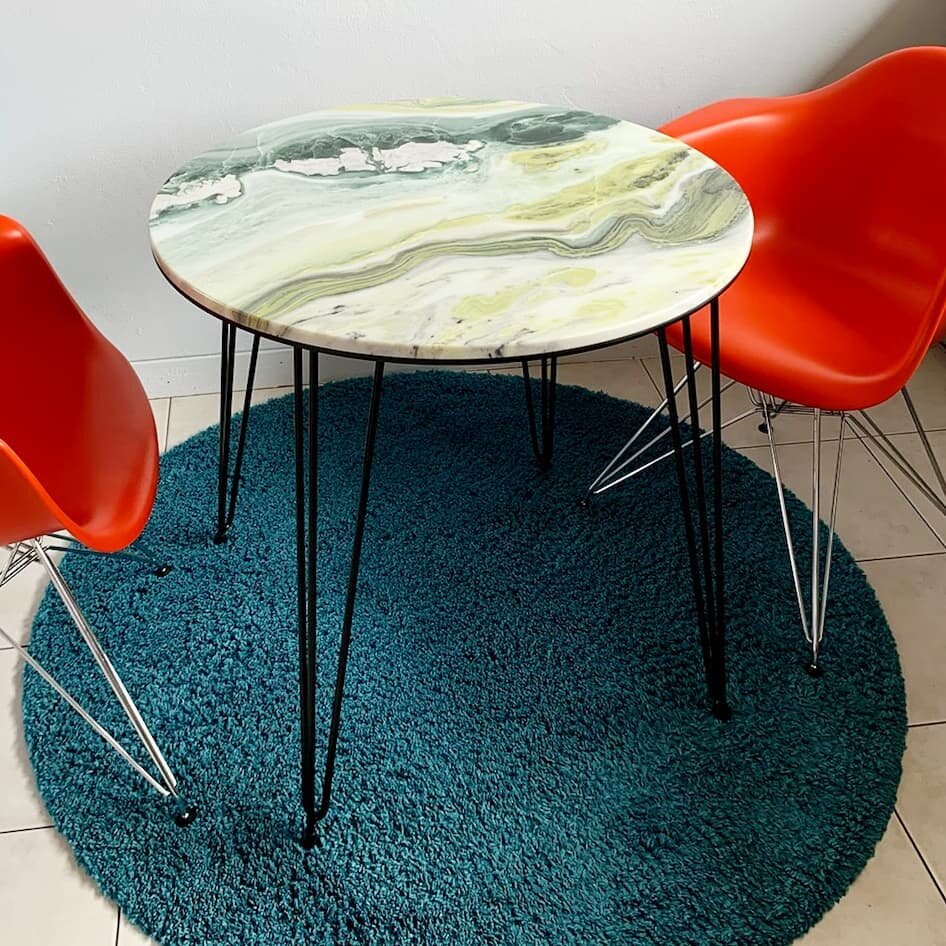 A nice round marble table with our simple pin legs.