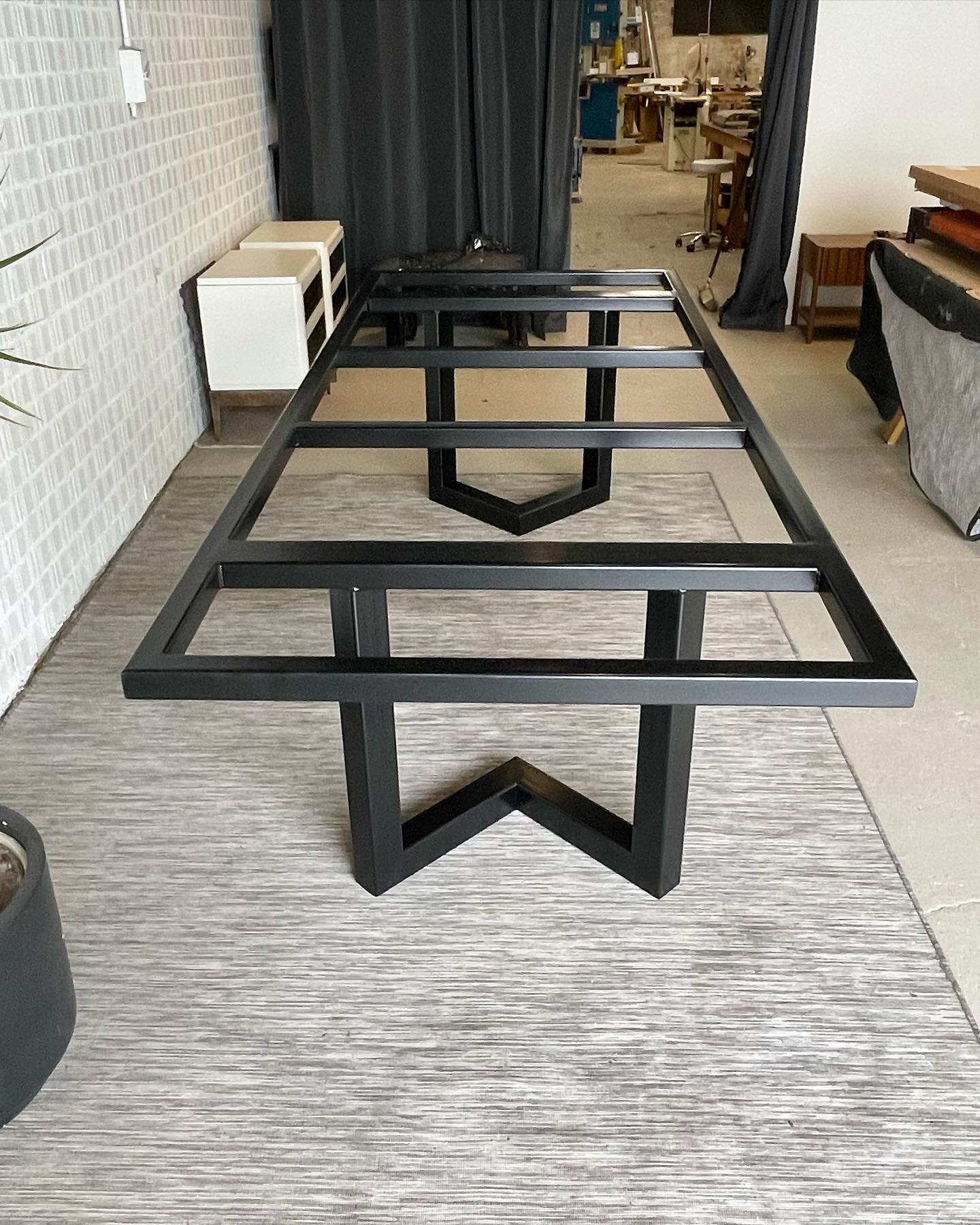 Chevron style table base currently sitting in @paradoxmovement workshop showroom. Designed to hold a 3 meter marble top.