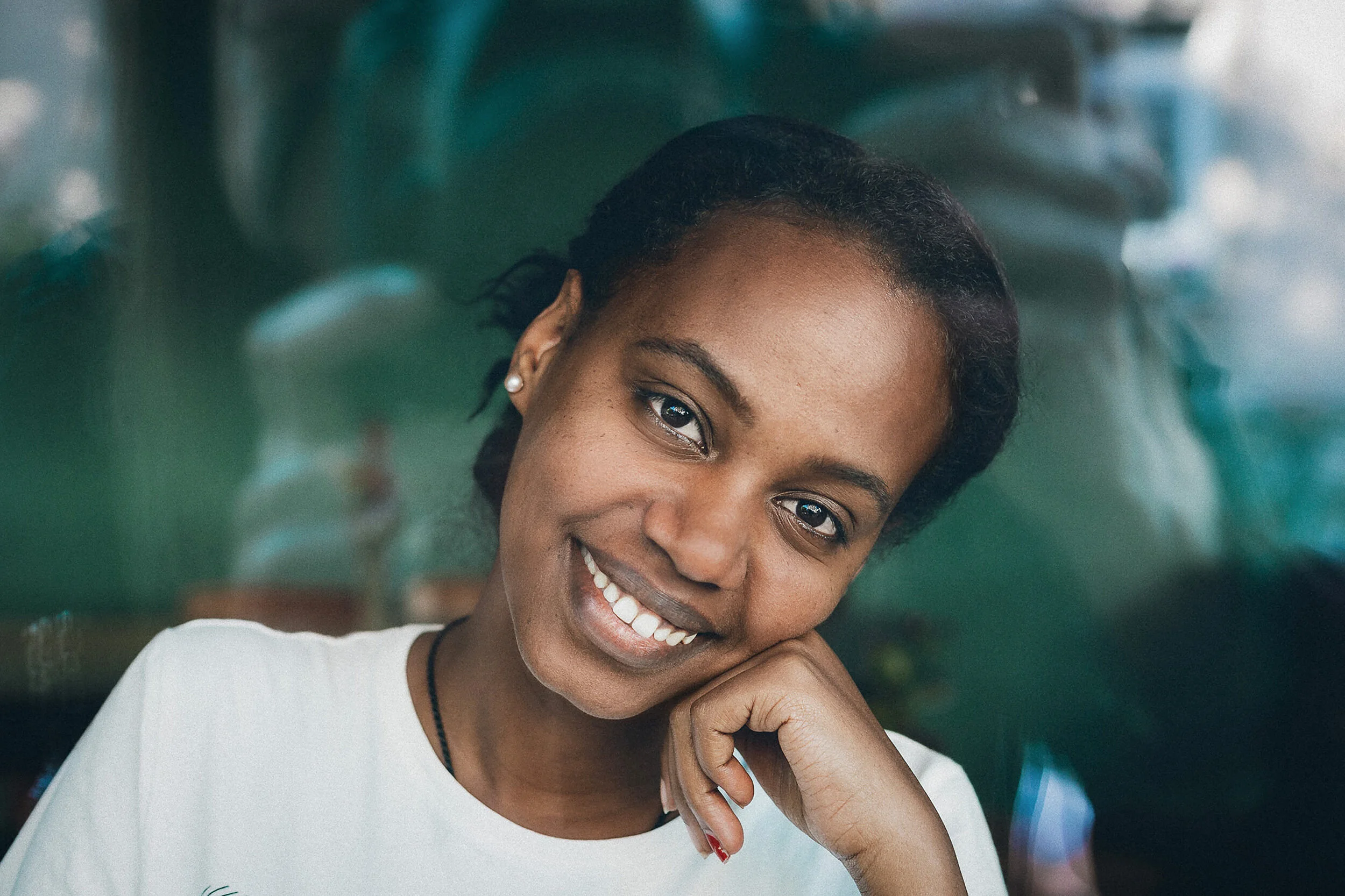 Smiling portrait of a woman at Sprachcafé Basel meeting