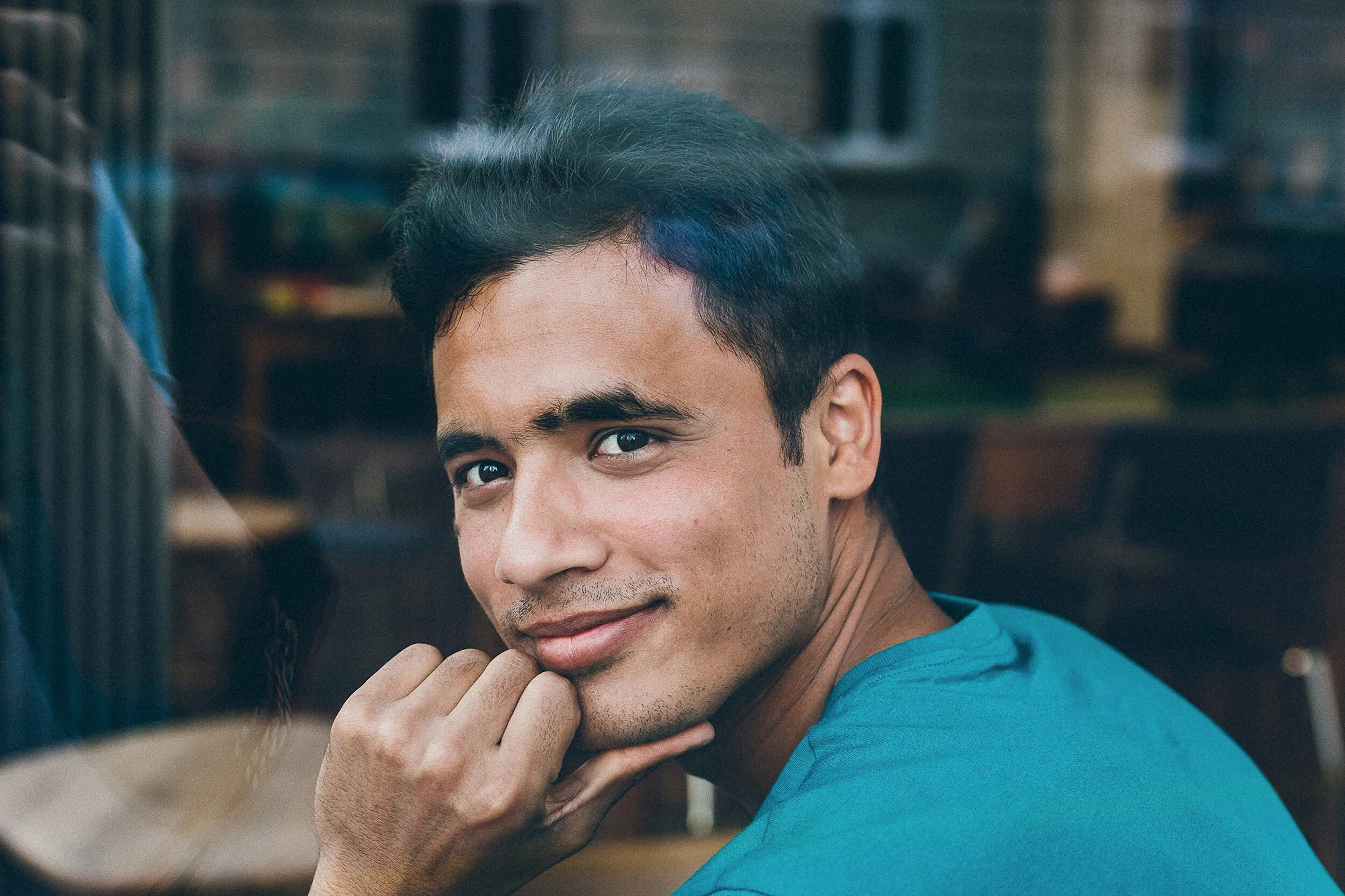 Portrait of a man through window at Sprachcafé Basel