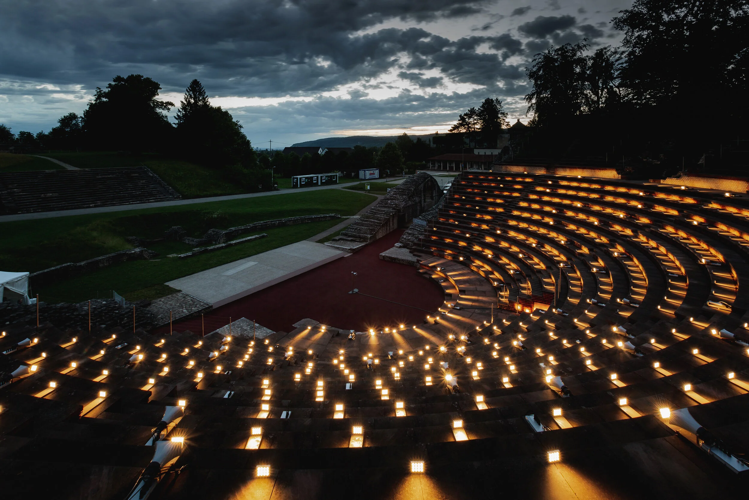 Evening view of Augusta Raurica amphitheater with art installation by Lozano-Hemmer