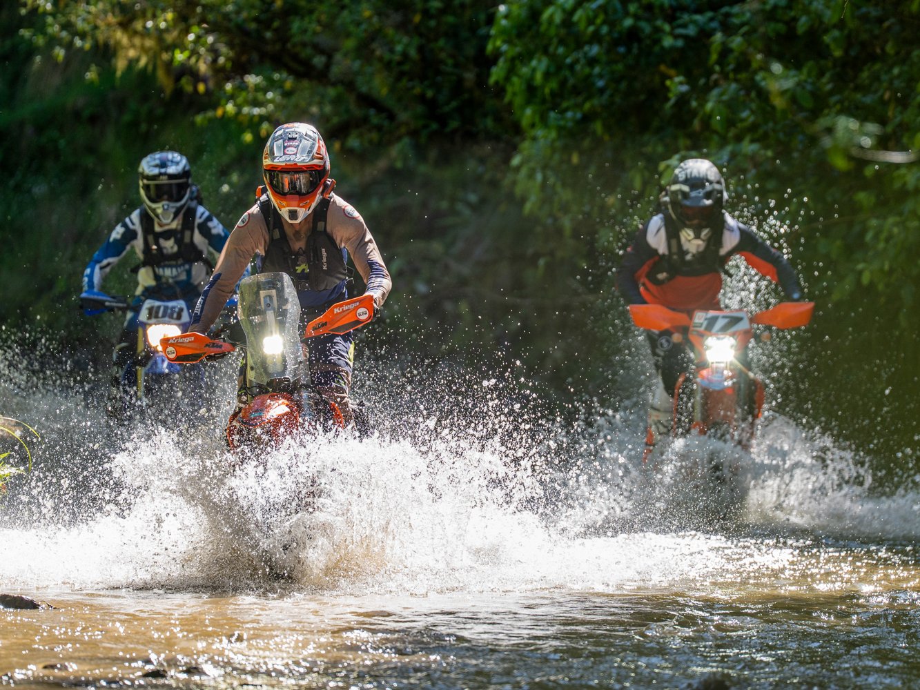 Dirtbikes river crossing in New Zealand