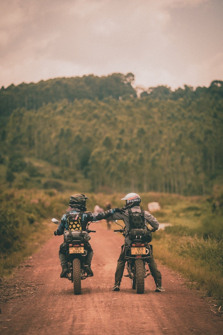 Adventure motorcyclists touring Uganda