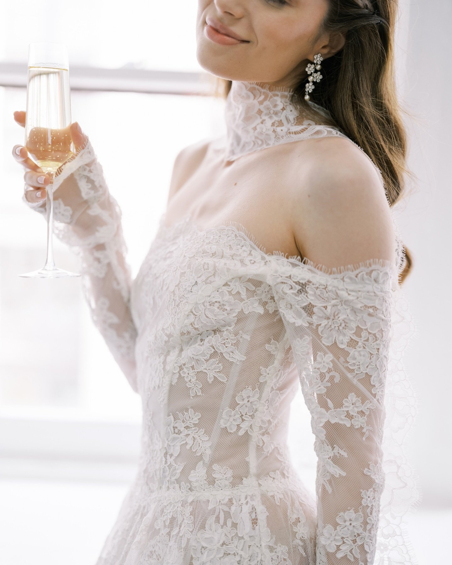 A small toast to what&rsquo;s to come.

Gown | @_houseofflora_
Photography | @sophiekayephotography
Hair &amp; Makeup | @mshbridalbeauty

~
~
~
~
~

#AlexiasBridal #FloraBride #LuxuryBride #EditorialBride #NewYorkBride