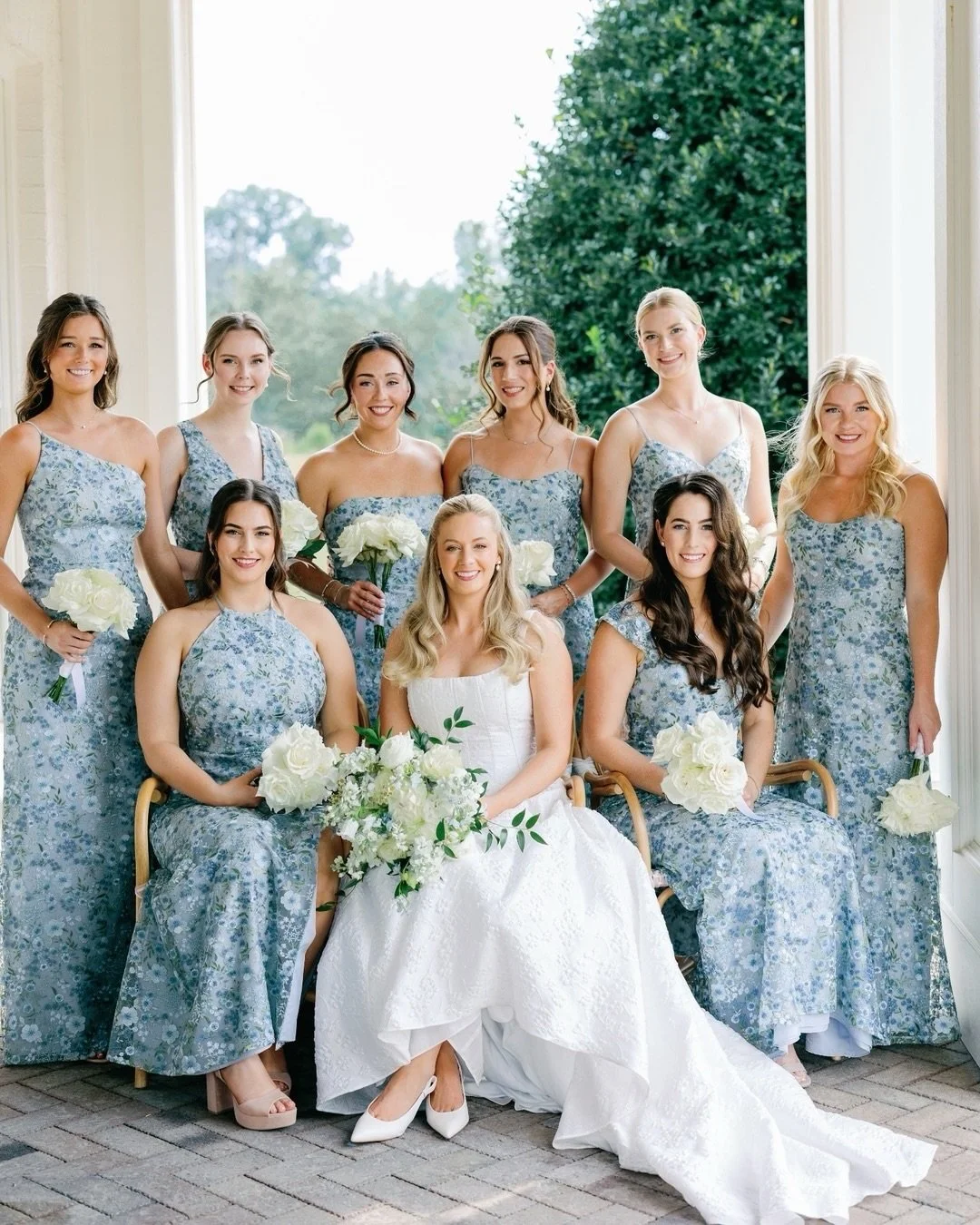 Molly surrounded by her closest friends in the prettiest blue florals &mdash; a picture-perfect complement to her Lela Rose gown.

More to come soon from her beautiful day with Austin. ✨

Gown | @lelarosebridal
Photography | @alainaronquillophoto
Pla