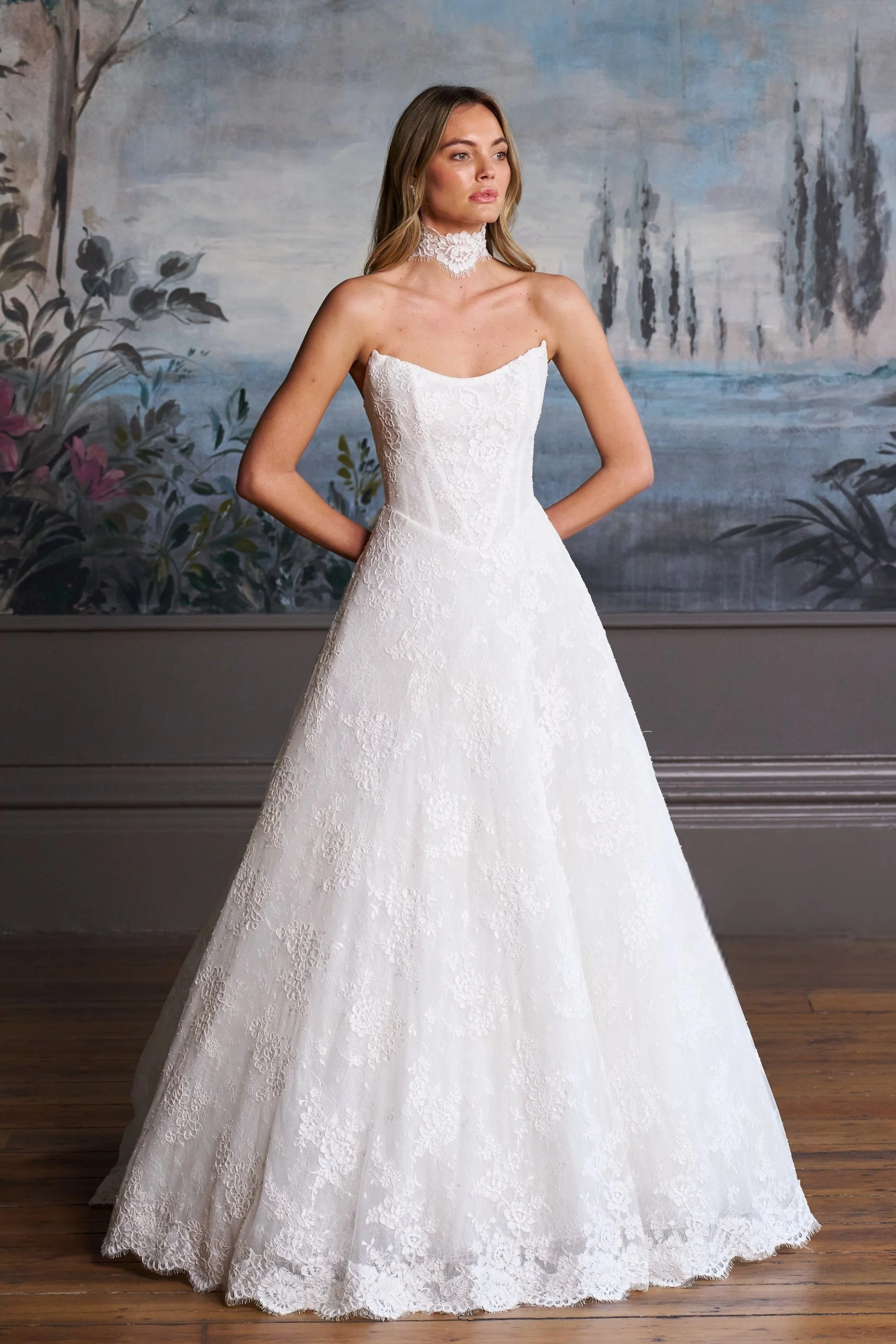 Caroline Castigliano Mirage wedding dress featuring an architectural A-line silhouette available exclusively at Alexia's Bridal in New York.