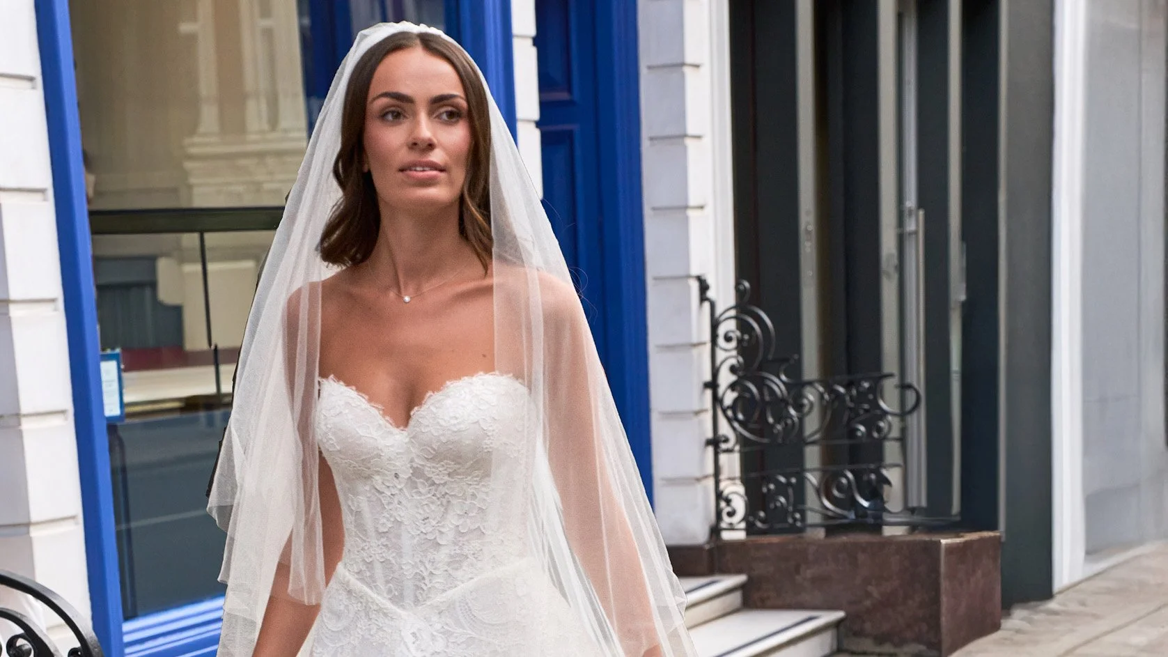 Bride wearing a Caroline Castigliano lace wedding gown in New York City, available exclusively at Alexia's Bridal SoHo.