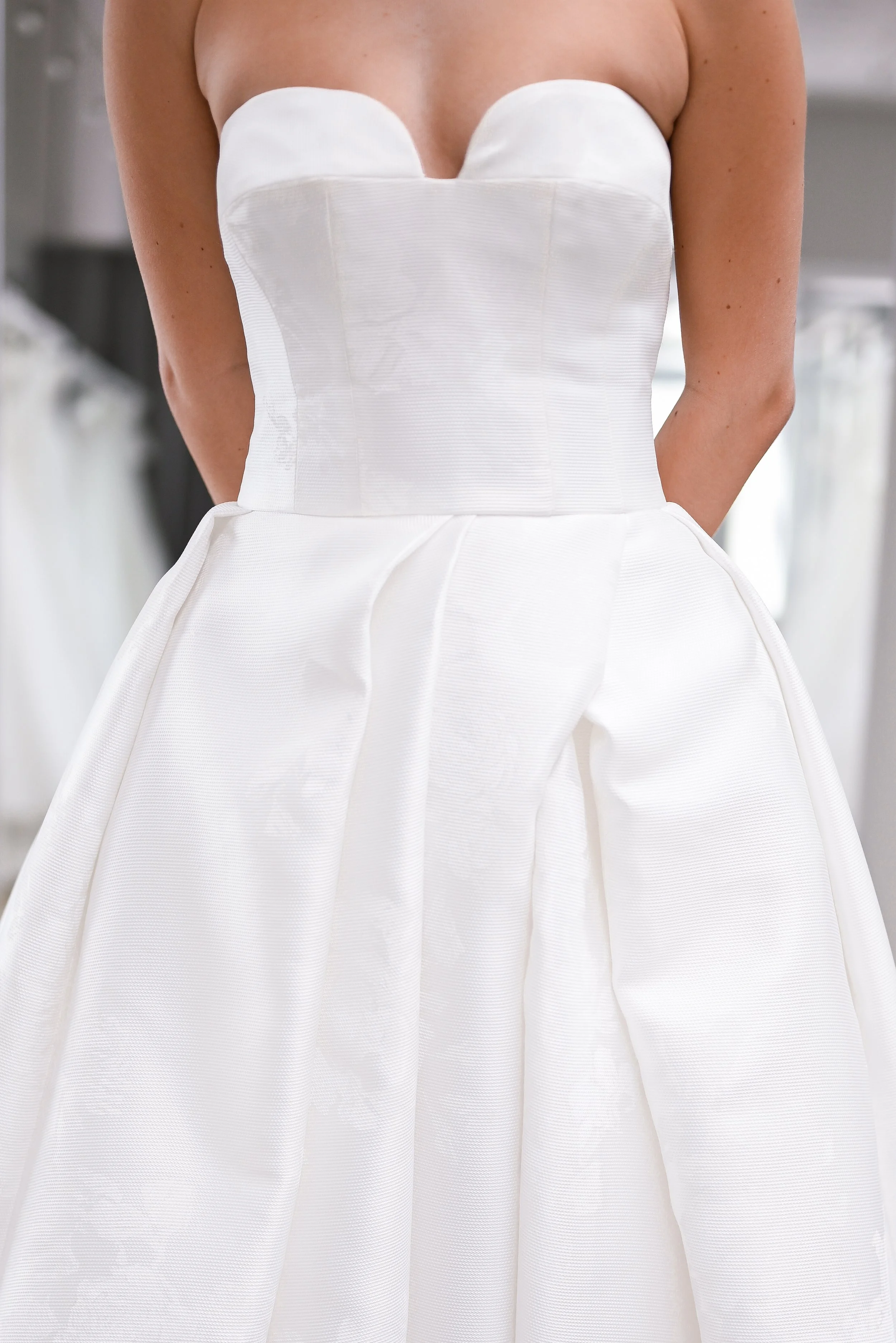reem-acra-flock-of-angels-wedding-dress-sample-front-detail.jpg