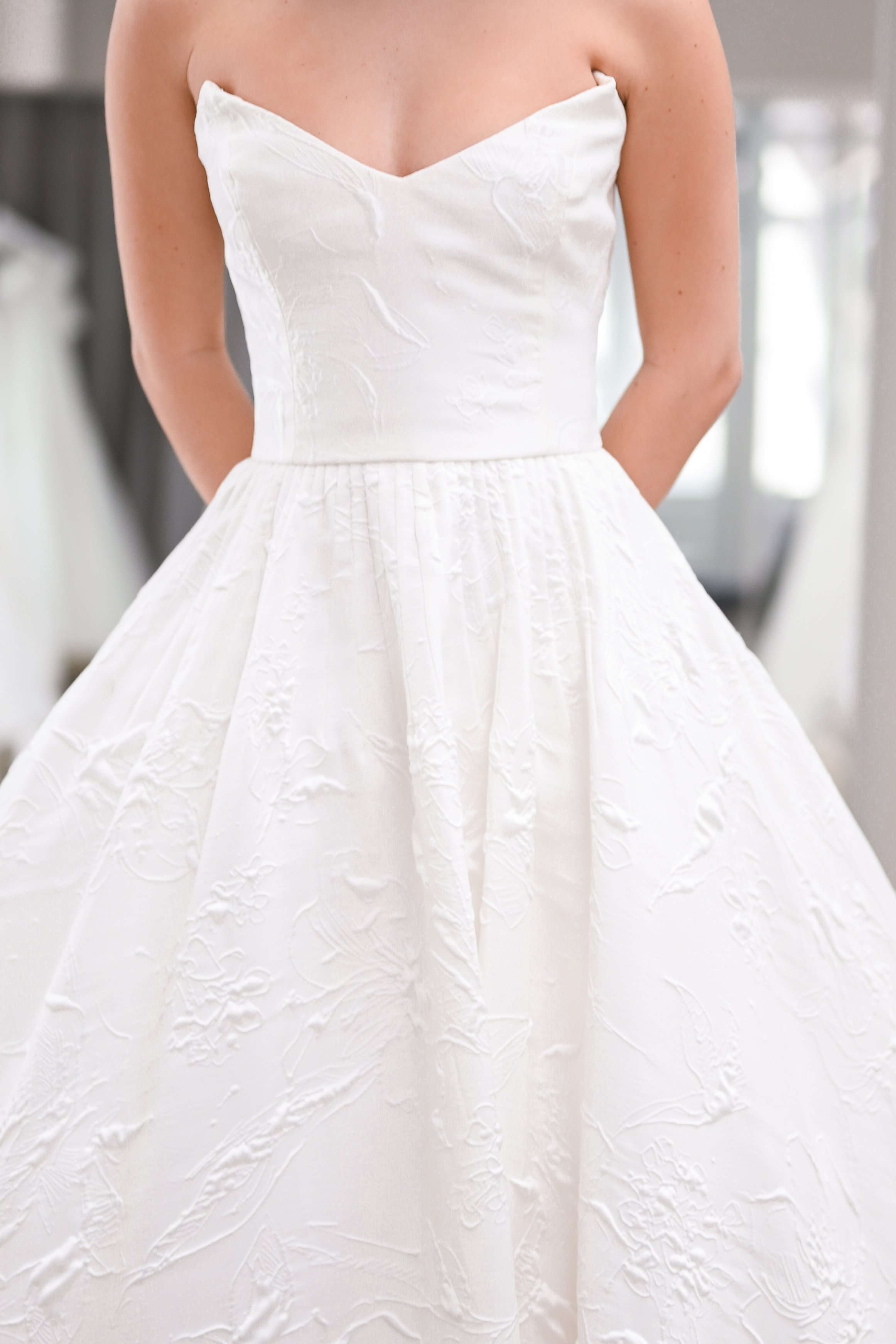 reem-acra-elegance-of-the-stars-wedding-dress-sample-front-detail.jpg