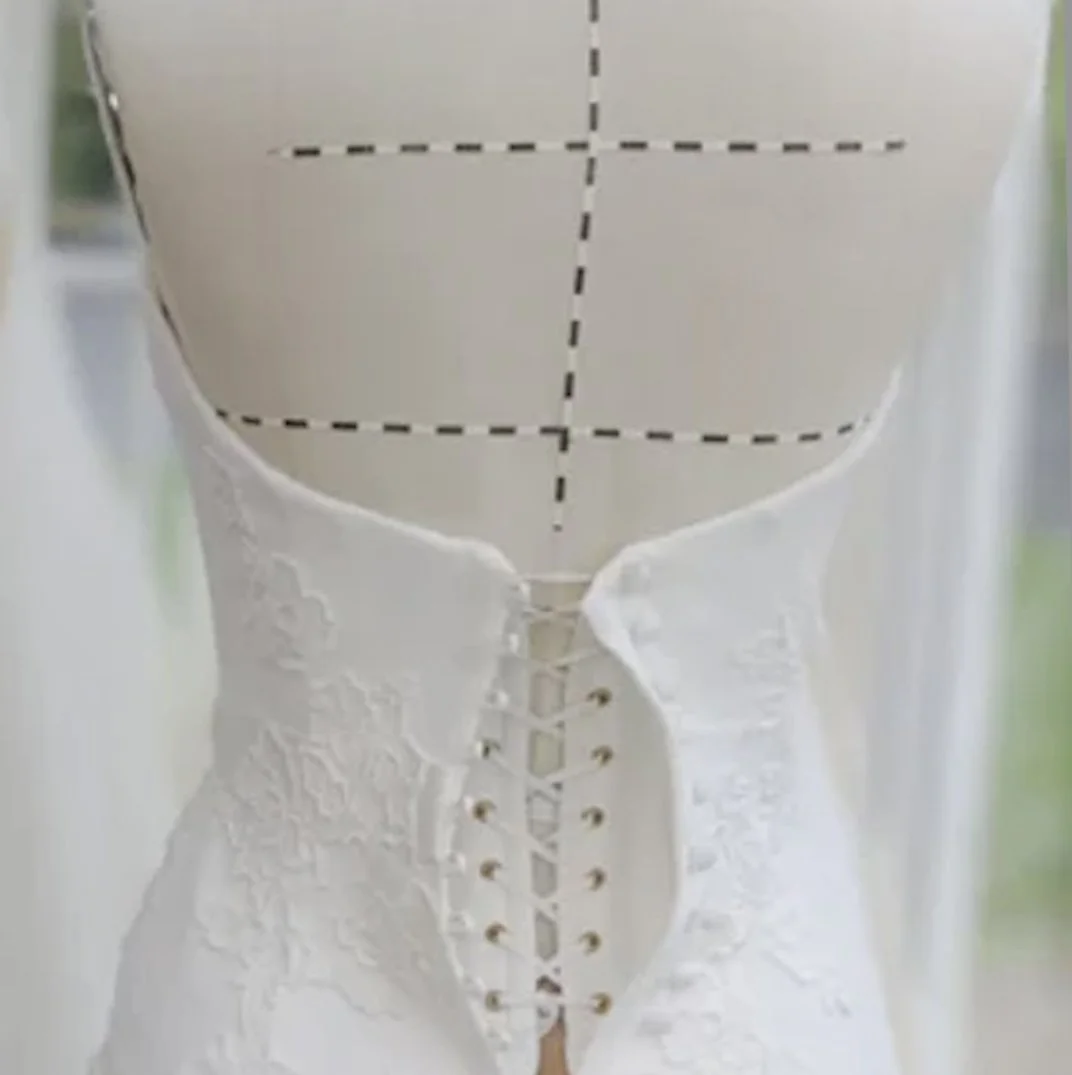 Internal corsetry detail in a Caroline Castigliano bridal gown, available at Alexia's Bridal in New York.