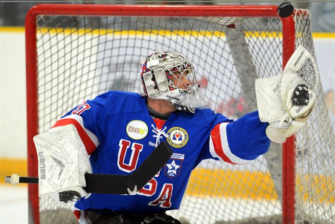 Ben normally plays for the Italian National Paralympic Sled Hockey team, but here he is filling in for the US team's goalie after an injury.