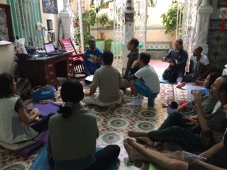 Rubio Cruz, YV2 Faculty, giving a presentation to YV2 participants in 2017 on his Abhyasa Yoga Programs in Holguin