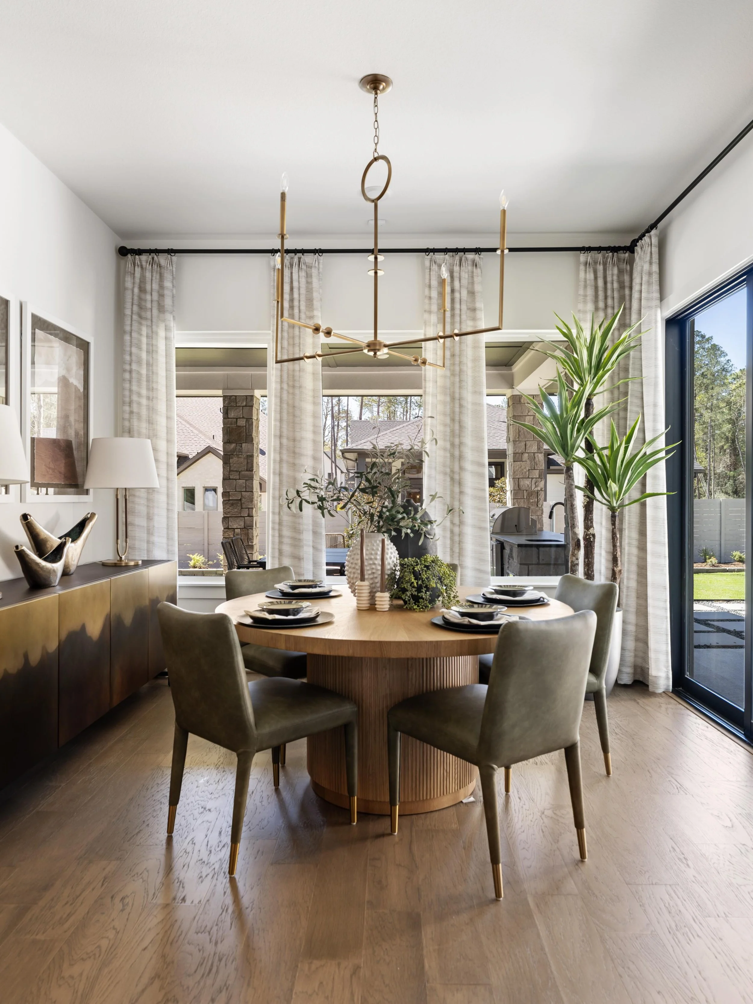 Even in an open layout, a dining room can still feel intimate! The right mix of lighting, materials, and texture creates separation without closing anything off.

#StatementLighting #NeutralInteriors #CustomInteriors #LuxuryHomeDesign #DesignDetails