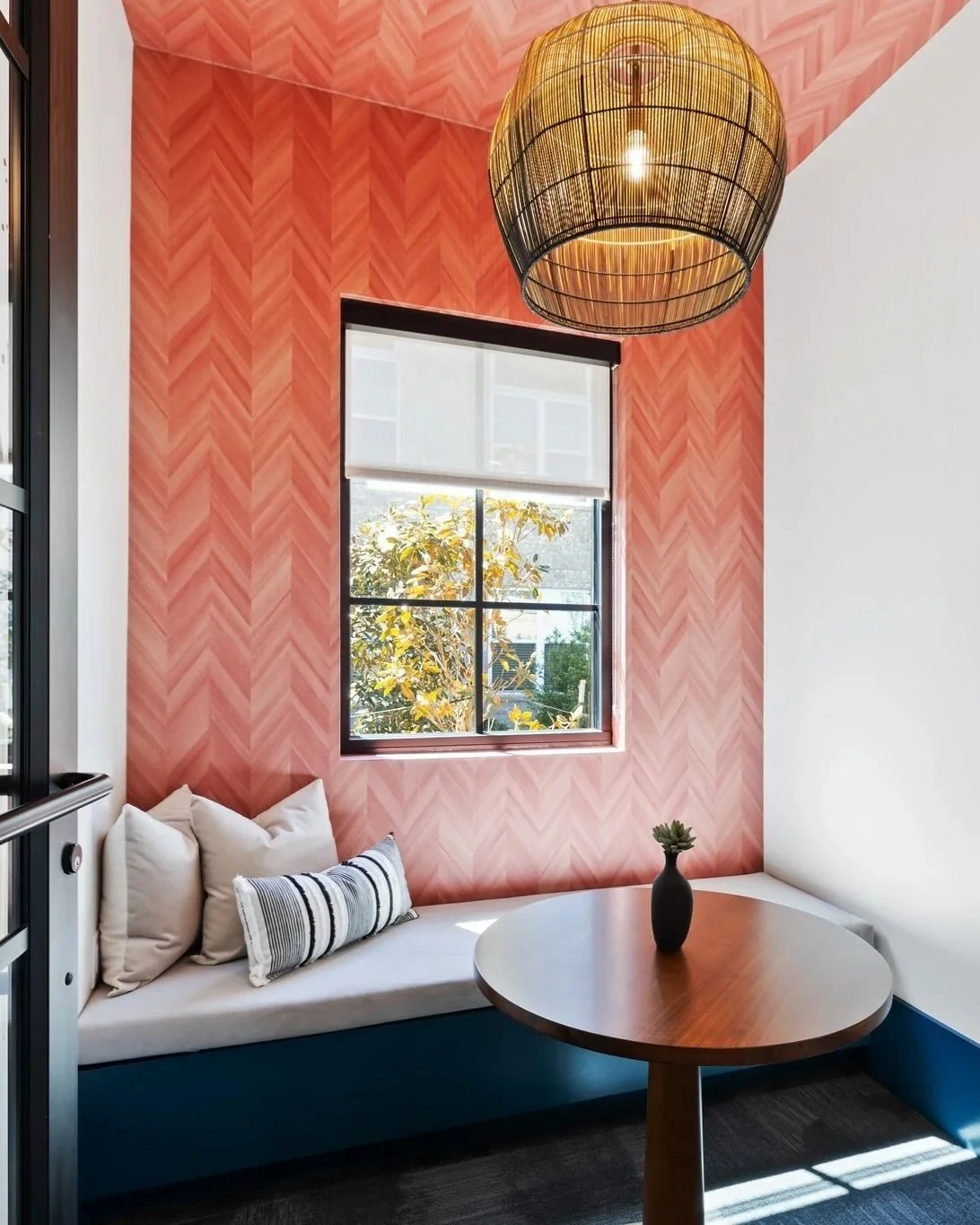 Who says a work pod has to be boring?
Chevron wallpaper and a window seat. glass-front conference rooms. a live-edge table with a view. a leather banquette and a marble top. every project gets its own vibe but the intention is always the same: give r