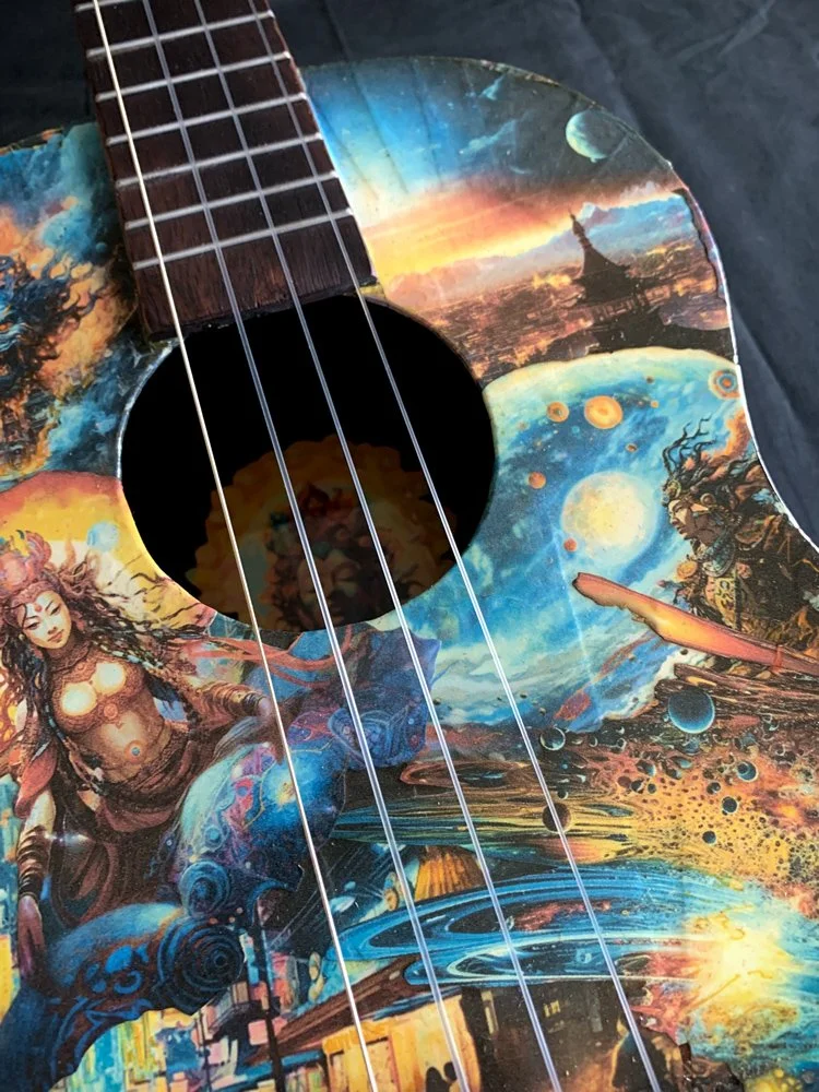 25001 art guitar 4 string baritone ukulele Lighting Up On The Astral Plane face lower.jpg