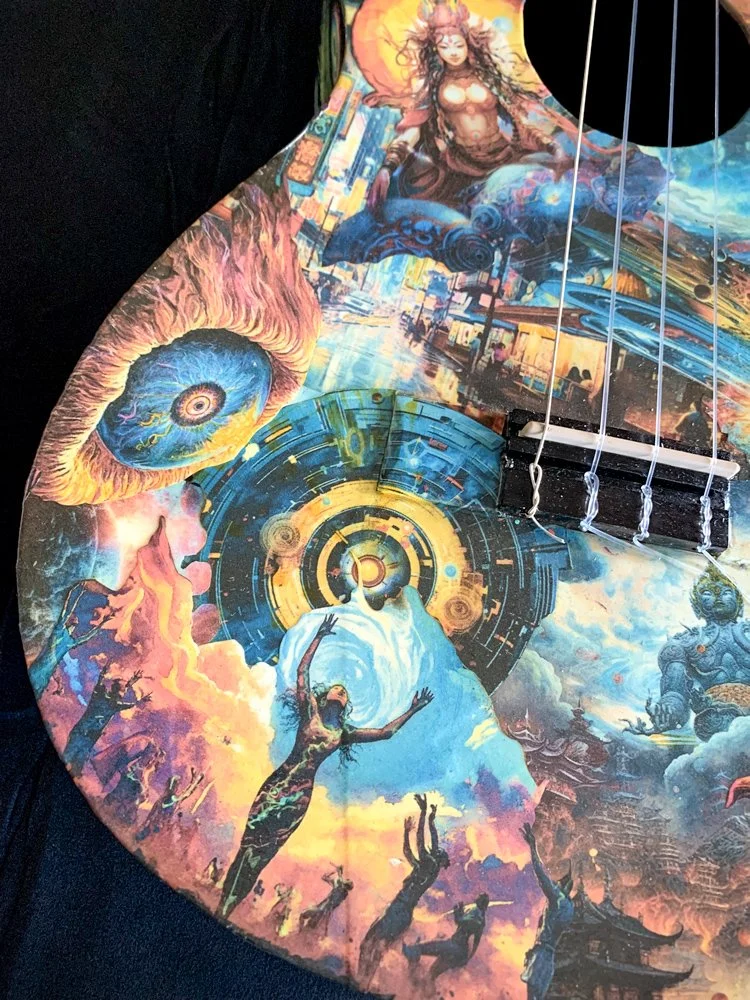 25001 art guitar 4 string baritone ukulele Lighting Up On The Astral Plane face lower top.jpg