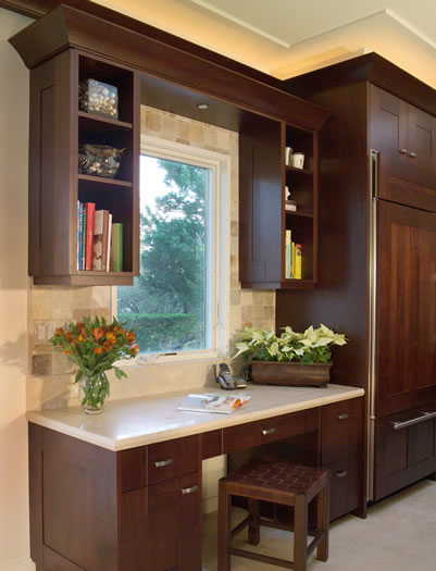 The integrated kitchen desk acts as the homes message center.