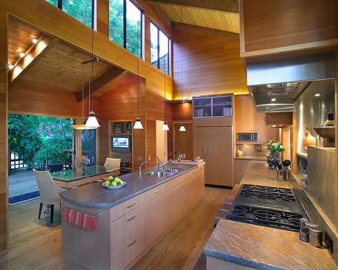 This custom movable table and pendant light can be positioned to work next to the island or separately.