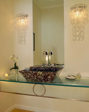 Custom marble sink on etched glass counter.