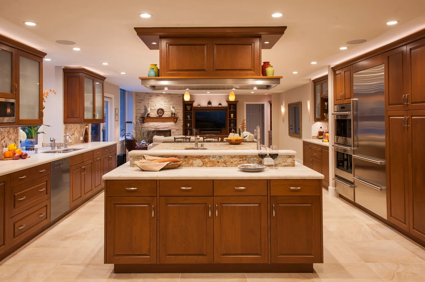 The custom hood and cabinetry are cherry with stainless steel accents.