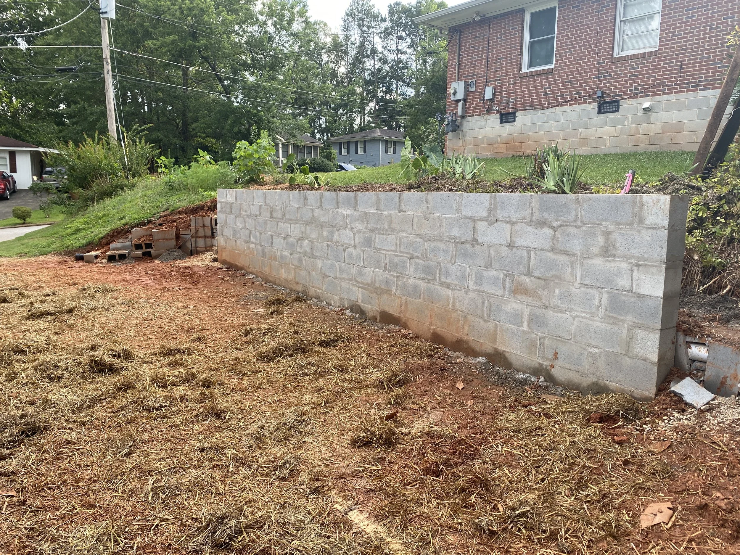  The end of the retaining wall 