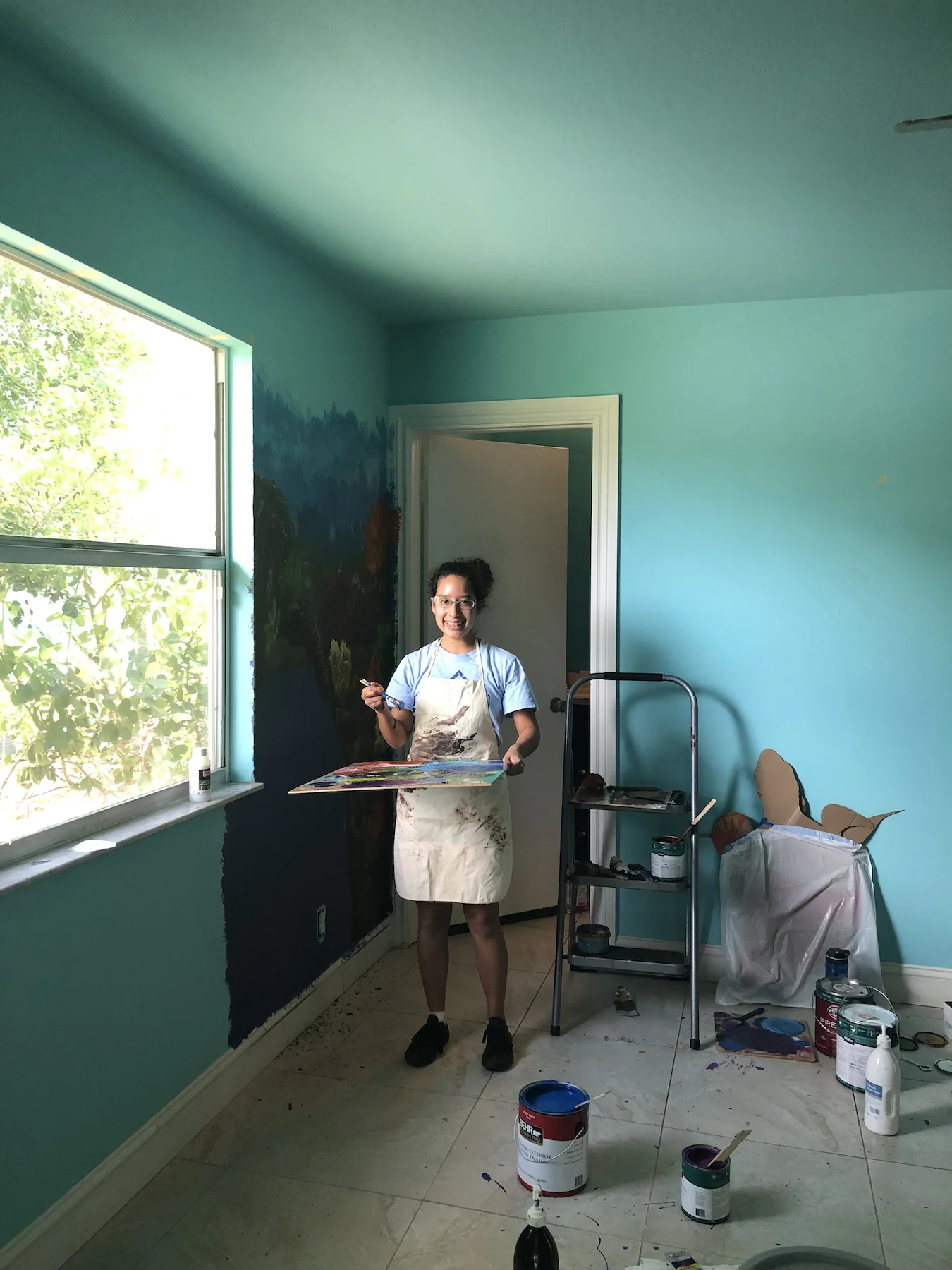 Barbara Del Castillo, 16, shared her talents painting murals at Valerie’s House new home in Naples.