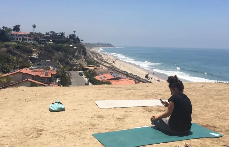 My friend Joelle getting the camera ready for some Acroyoga playtime at our favorite spot! Beautiful San Clemente, California.