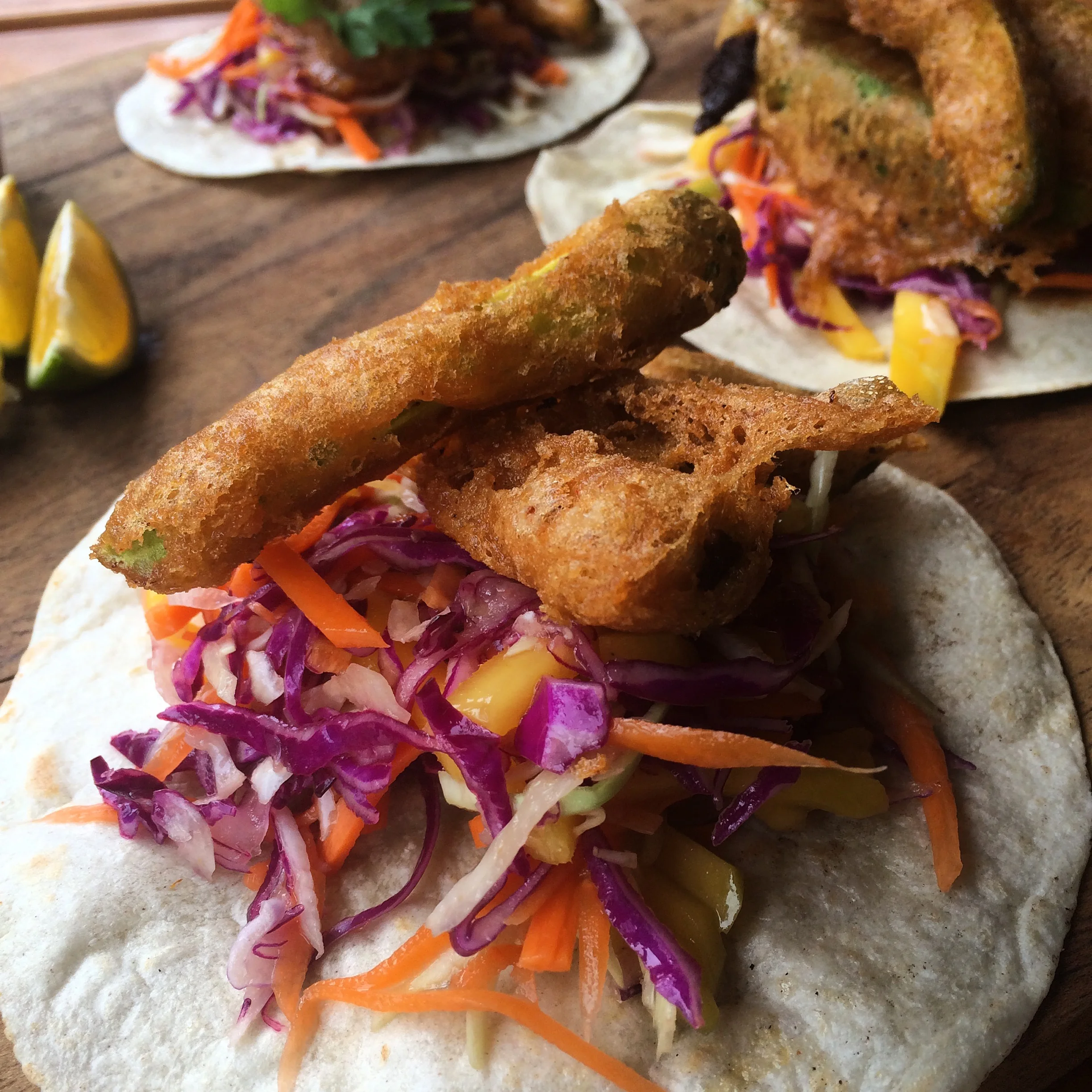 These super bomb, vegan, tempura fried avocado tacos at The Bakery in ST.