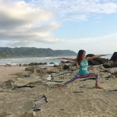 Wearing Yoga Travel Tree's "Will Travel For Yoga" tank top around the world. This was one of the prizes for Week 3 of #JetSetYogi! Also in Sulara Wear leggings (week 4's sponsor). In Santa Teresa, Costa Rica - Photo by Lauren Leduc.